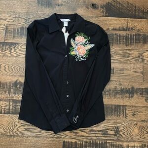 Long sleeve button down shirt. Super cute floral pattern, and never worn.